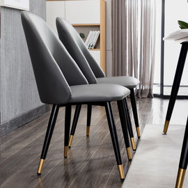 Las altas sillas de lujo del comedor del cuero trasero con las piernas del metal crean para requisitos particulares